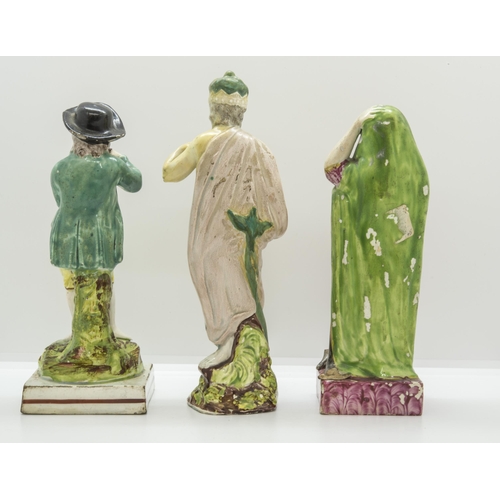 1118 - A GROUP OF PEARLWARE FIGURESCirca 1830s, Hope, Neptune and wine harvester, tallest is 12.5cms high... 