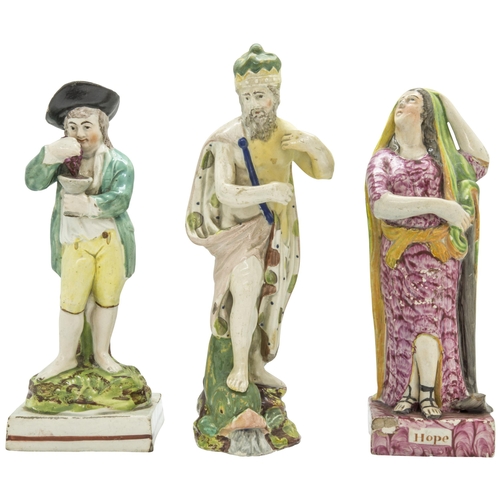 1118 - A GROUP OF PEARLWARE FIGURESCirca 1830s, Hope, Neptune and wine harvester, tallest is 12.5cms high... 