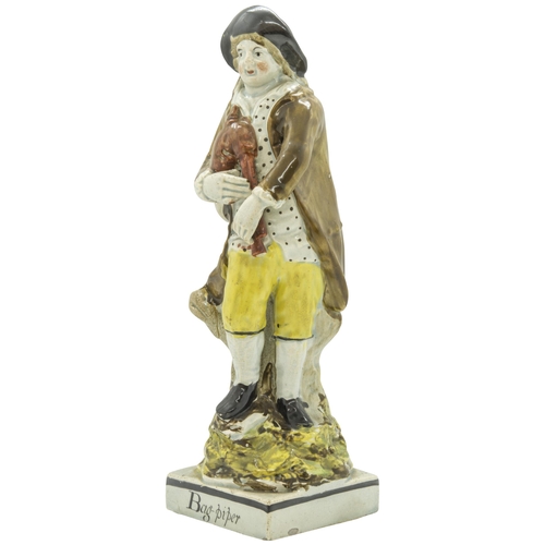 1120 - A PEARLWARE FIGURE ENTITLED 'BAG-PIPER'Cira 1820, probably Ralph Wood, 22 cms high