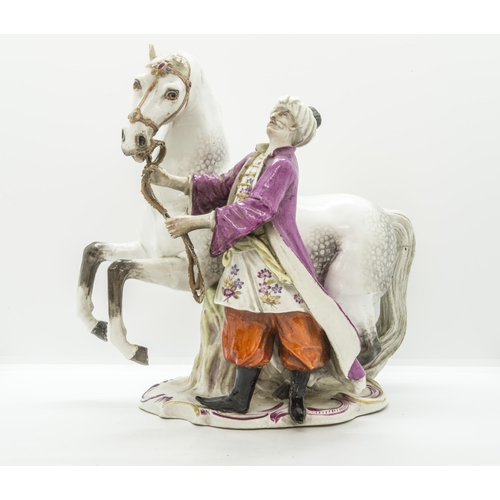 1126 - AN EQUESTRIAN FIRGURE OF A HORSE WITH TURKISH ATTENDANT19th century, probably Meissen, incised '135 ... 