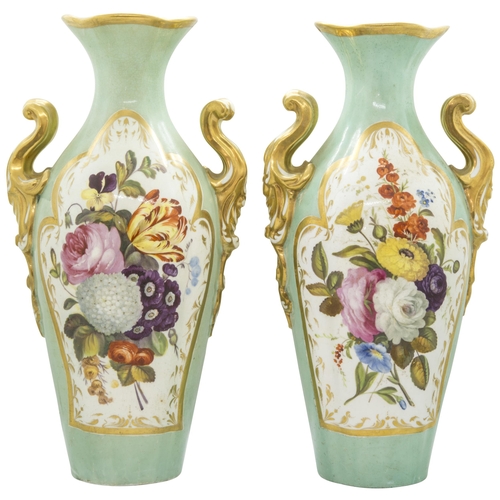 1128 - A PAIR OF STAFFORDSHIRE CELADON GROUND VASESMid 19th century, painted with floral panels and marblin... 