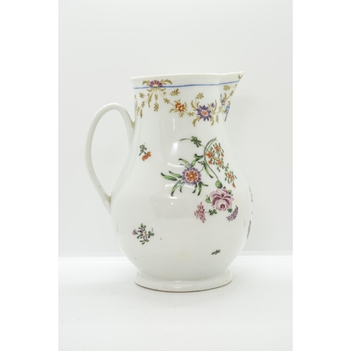 1129 - A MID 18TH CENTURY CIDER JUG,Painted with floral swags and sprays, 22cms high