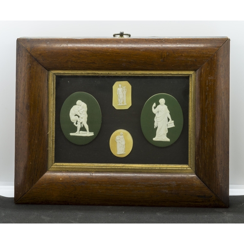 1144 - TWO GREEN AND TWO YELLOW GROUND JASPER PLAQUES IN ROSEWOOD FRAME19th century, in rosewood frame, 32c... 