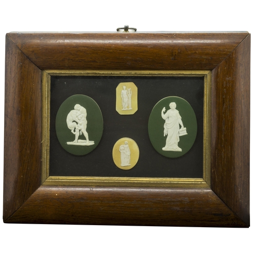 1144 - TWO GREEN AND TWO YELLOW GROUND JASPER PLAQUES IN ROSEWOOD FRAME19th century, in rosewood frame, 32c... 