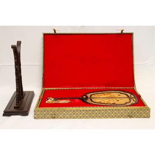 2163 - A CHINESE HARDWOOD FAN AND STANDCIRCA 2005in a fitted case 47.5cm high