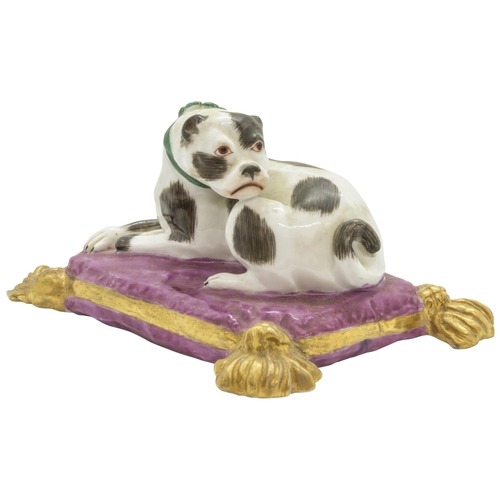 1156 - A MODEL OF A RECUMBANT HOUND ON A CUSHION19th century, 14cms