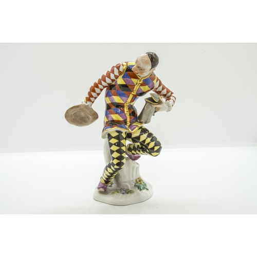 1158 - A MEISSEN COMEDIA DELL'ARTE FIGURE AFTER KANDLER20th century, impressed '64556' to base 15.5cms high... 