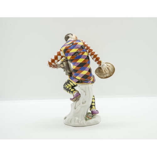 1158 - A MEISSEN COMEDIA DELL'ARTE FIGURE AFTER KANDLER20th century, impressed '64556' to base 15.5cms high... 