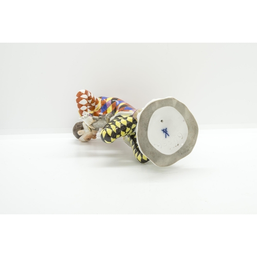 1158 - A MEISSEN COMEDIA DELL'ARTE FIGURE AFTER KANDLER20th century, impressed '64556' to base 15.5cms high... 