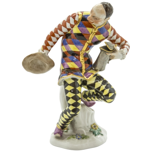 1158 - A MEISSEN COMEDIA DELL'ARTE FIGURE AFTER KANDLER20th century, impressed '64556' to base 15.5cms high... 