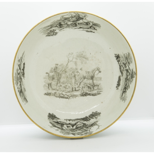 1178 - A WORCESTER PUNCH BOWLCirca 1770, printed with hunting scenes after Robert Hancock, 28cms wide