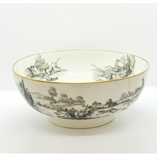 1178 - A WORCESTER PUNCH BOWLCirca 1770, printed with hunting scenes after Robert Hancock, 28cms wide