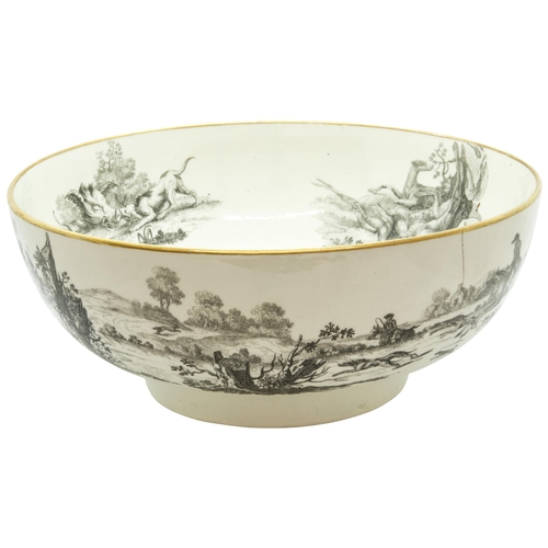 1178 - A WORCESTER PUNCH BOWLCirca 1770, printed with hunting scenes after Robert Hancock, 28cms wide