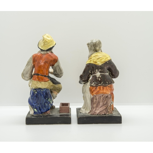 1181 - ENOCH WOOD A PAIR OF FIGURES OF JOBSON AND NELLCirca 1800, impressed '27', 17cms high