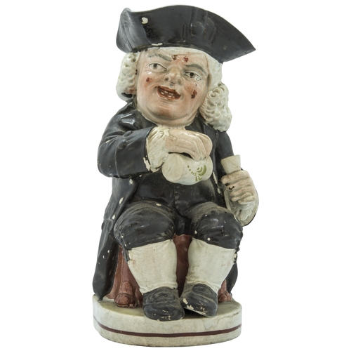 1184 - A 'DRUNKEN PARSON' TOBY JUG, PROBABLY WOOD AND CALDWELLCirca 1800, 25cms high