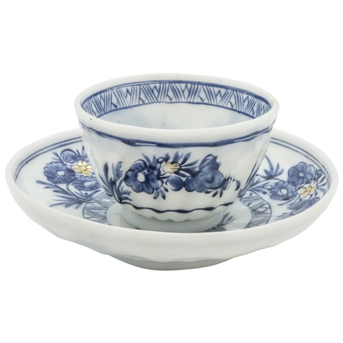 1271 - A EUROPEAN MILK GLASS TEA BOWL AND SAUCER18th century, decorated in imitation of Chinese export blue... 