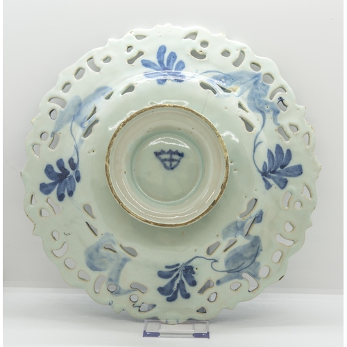 1196 - A SAVONA PIERCED FOOTED DISH17th 18th century, painted with a landscape, 29cms wide