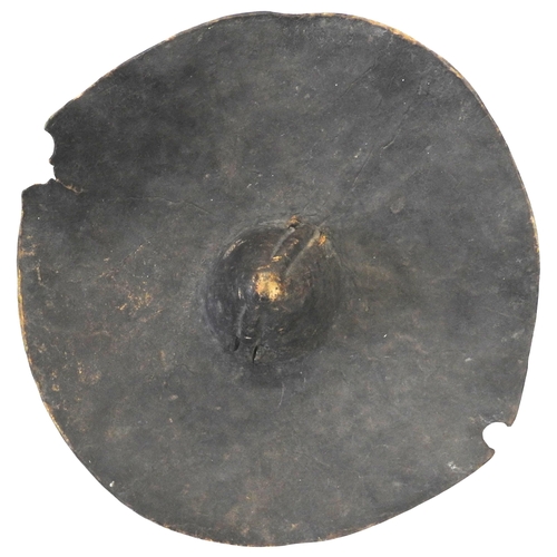 1330 - A SUDANESE BEJA ELEPHANT HIDE SHIELD, 19TH CENTURY, circular form with a central conical boss and tw... 