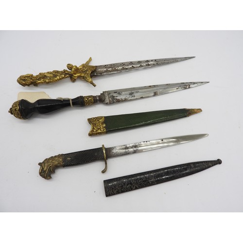 612 - A CONTINENTAL 'DAGGER'; OR DESK KNIFE WITH RETICULATED STEEL BLADE AND CAST BRASS ORNATE GRIP , Anot... 