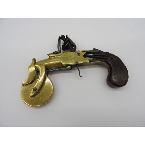 621 - A FLINTLOCK POWDER TESTER WITH BRASS FRAME AND INDICATOR WHEEL and slab handled grip (Now damaged) e... 