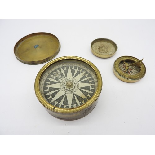 1449 - A VICTORIAN BRASS CASED POCKET COMPASS the printed paper marked ‘Made by Spencer & Co., No. 66, ... 