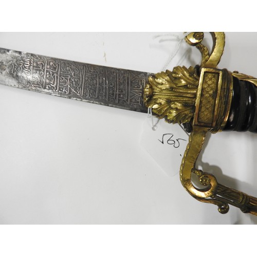 648 - AN 18TH CENTURY OFFICERS SWORD the ornate gilt hilt with wired ebony grip, the ‘captured&rsquo... 