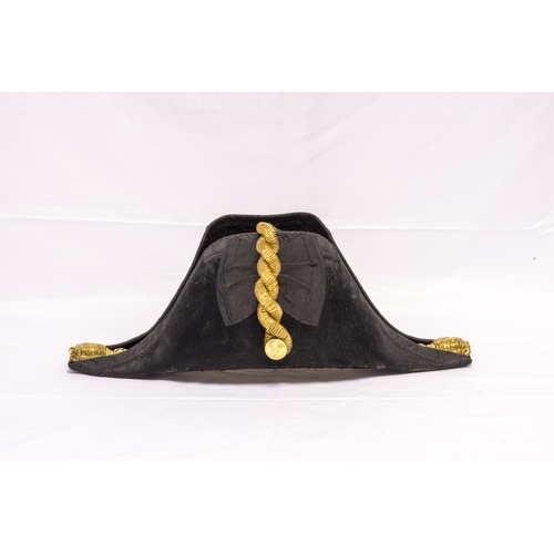 674 - A GEIVE MATTHEWS AND SEAGROVE LTD. NAVAL BICORN HAT AND EPAULETTES in a velvet lined tin transit cas... 