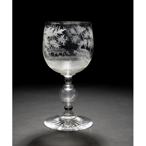 1273 - A LARGE VICTORIAN ENGRAVED GLASS, the bowl decorated with a scene of a deer in woodland upon a spher... 