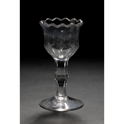 1282 - A GEORGIAN SWEETMEAT GLASS THE CUT RIM WITH FACET CUT BOWL UPON A CUT STEM WITH PLAIN FOOT.16.5 cms... 