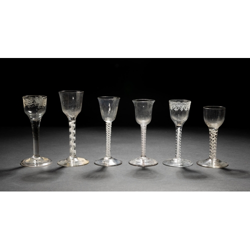 1293 - A GEORGIAN OPAQUE TWIST CORDIAL GLASS WITH ENGRAVED BOWL,four others and a plain stemmed cordial gla... 