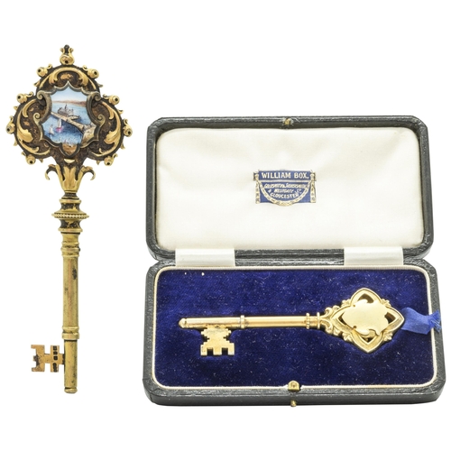 789 - A SILVER GILT AND ENAMEL PRESENTATION KEY TO ** WILSON BY THE ARCHITECTS ON THE OPENING OF VICTORIA ... 