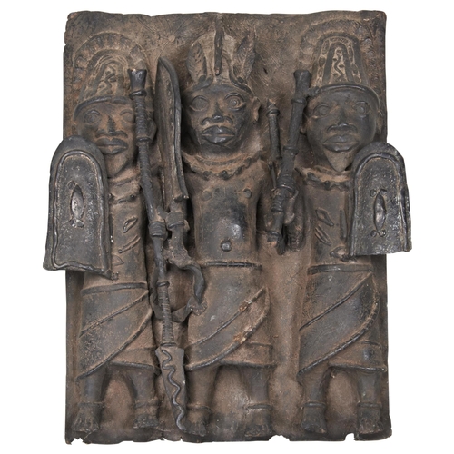 1332 - A 'BENIN' BRONZE PLAQUE 20th CENTURY, Depicting three standing warriors. 60 x 44cms