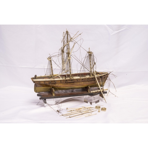 1424 - A 19TH CENTURY BOAT HULL MODEL, plank built with deck details including         two glazed deck ligh... 