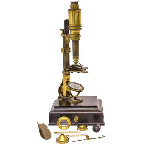 1463 - AN 18TH CENTURY CUFF TYPE MICROSCOPE POSSIBLY BY GEORGE STERROP the miscroscope on a shaped mahognay... 