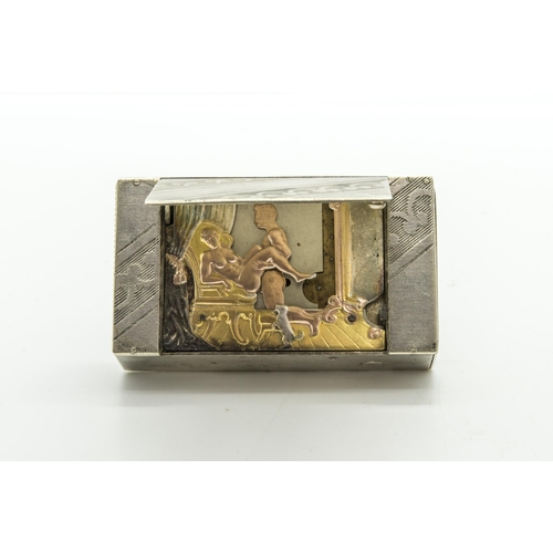 1480 - AN EROTIC ELECTROPLATED MECHANICAL VESTA CASE, the compartment lid activating a catch to reveal a po... 