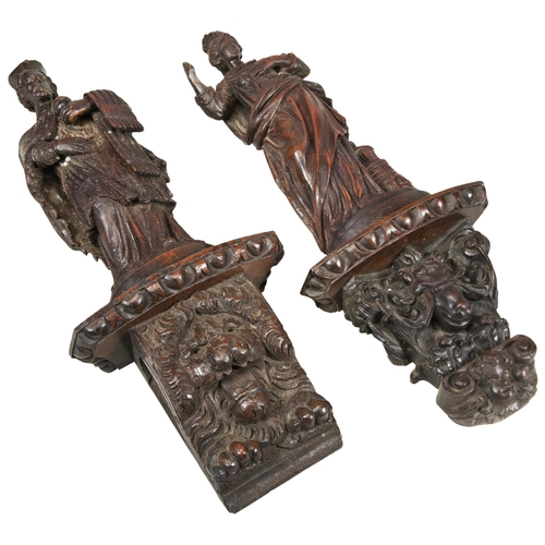 1792 - A CARVED WOODEN FIGURE OF A PRIEST MOUNTED ON A COMPOSITE BRACKET and a carved wooden biblical figur... 