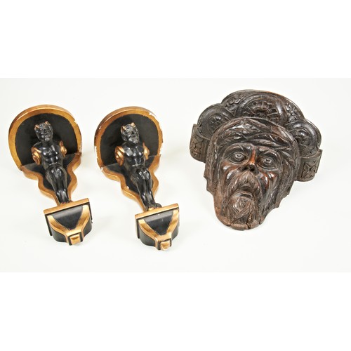 1799 - A 19TH CENTURY CARVED OAK WALL BRACKET IN THE FROM OF A MOOR'S HEAD and a pair of 19th century Frenc... 