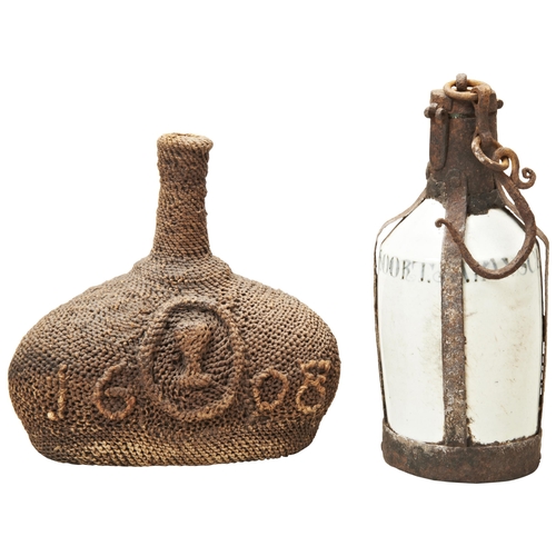 1808 - AN OVOID WOVEN JUTE TWINE COVERED BOTTLE WITH THE DATE 1608 and a wine glass in a roundel woven into... 