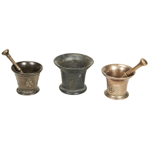 1810 - A 17TH CENTURY BRONZE MORTAR CAST WITH HEADS OF CHARLES II and two others smaller, with two associat... 