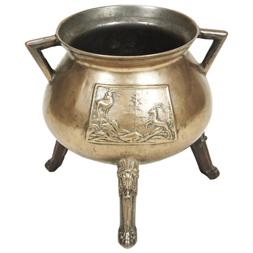 1817 - A CONTINENTAL BRONZE TRIPOD CAULDRON, possibly Flemish, 16th/17th century, cast with a panel of moun... 