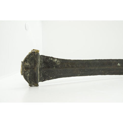 1297 - A COPPER ALLOY SWORD, possibly bronze age, the hilt with 20th century repair marks. 46 cms long     ... 