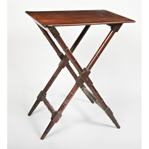 1715 - A HIGH MAHOGANY FOLDING CAMPAIGN TABLE the top with brass inset screw mount the legs with ring turne... 