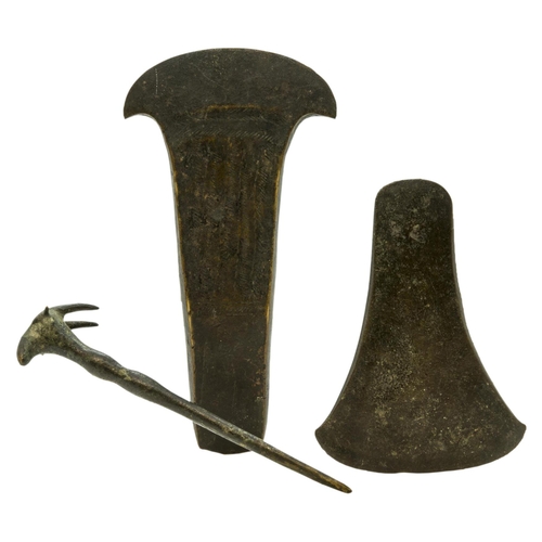 1298 - A BRONZE AGE FLANGED AXE HEAD with incised decoration and a plain flat Bronze Age Axe head and a bro... 