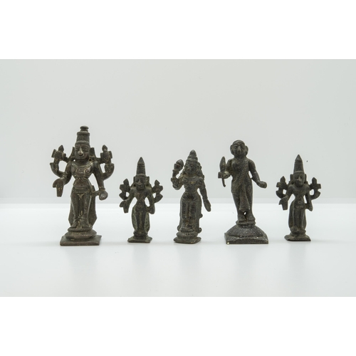 2234 - AN INDIAN CARVED WOODEN MONKEY, assorted bronze votive figures of various deities, Ashanti bronze go... 