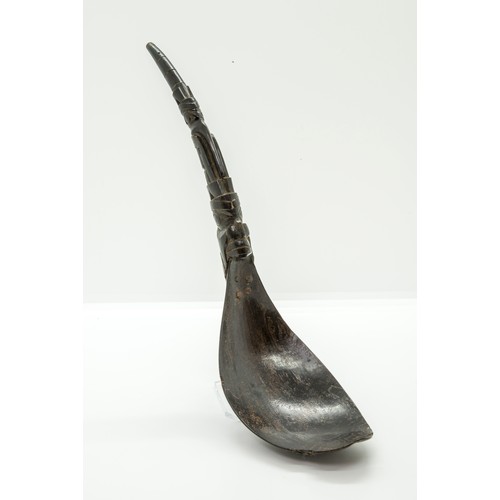 1341 - A 19TH CENTURY HAIDA OR INUIT MOUNTAIN GOAT HORN SPOON, the handle riveted to the bowl and Carved wi... 