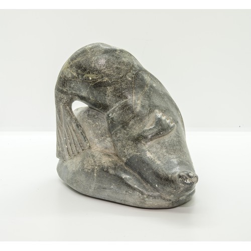 1342 - AN INUIT SOAPSTONE CARVING OF A SEAL, incised marks to the base L-KE.16 cms high