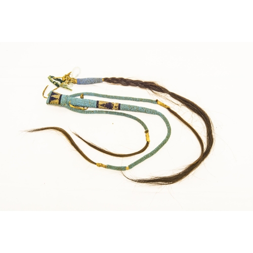 1357 - A NATIVE AMERICAN BEADED WAND, with four beaded strands tipped with strands of human hair, two beade... 