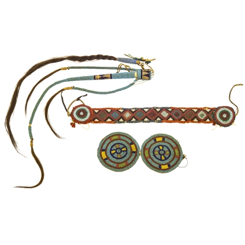 1357 - A NATIVE AMERICAN BEADED WAND, with four beaded strands tipped with strands of human hair, two beade... 