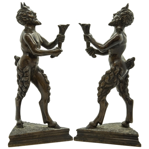 1830 - A PAIR OF BRONZE SATYR CANDLESTICKS IN THE MANNER OF SEVERO CALZETTA DA RAVENNA, Standing upon trian... 