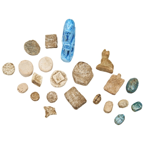 1309 - AN EGYPTIAN SCARAB. Five others, two amulet beads, an assortment of terracotta seals and a faience f... 